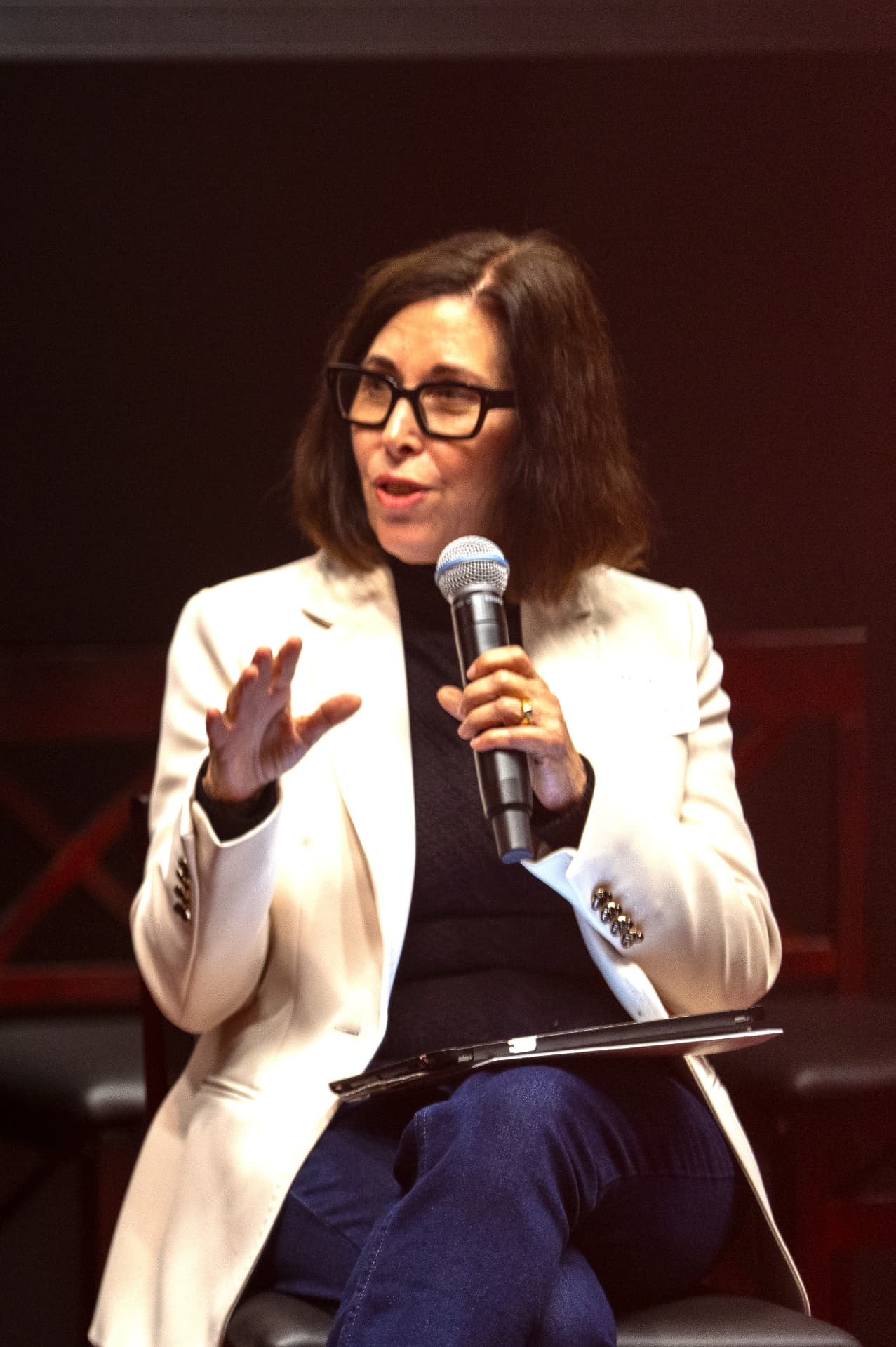 Merril Gilbert speaking on a panel.